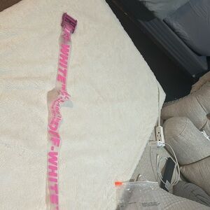 Pink and clear Off-White brand belt. New in bag it came in. Never worn. No tags